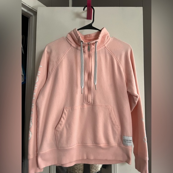 Calvin Klein pullover in peachy pink. Size is small. - Picture 1 of 3